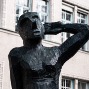 Black wooden sculpture by Josef Lang