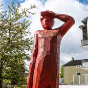 Red wooden sculpture by Josef Lang